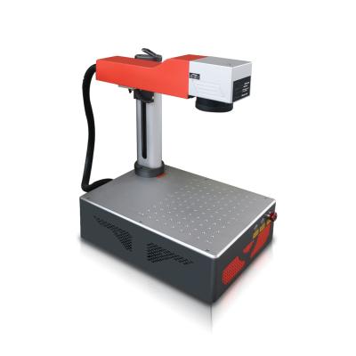 China Mini Optical Fiber Laser Marking Machine For Plastic Metal Engraving 20W 30W for sale