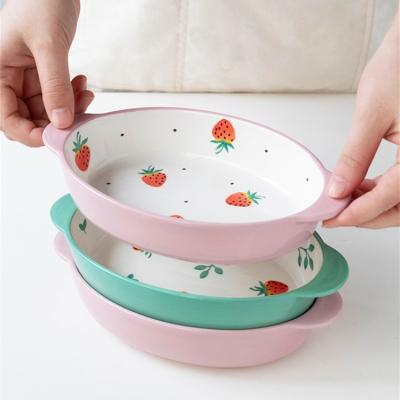 China Viable Hot Selling Oval Cutter Printing Hand Painted Ceramic Ramekins Ceramic Bakeware With Handle for sale