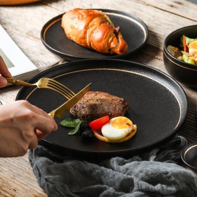 China Factory Size Disposable Slap-up Stoneware Plates Round Steak Serving Plate Ceramic Wholesale Black Dinner Dish With Gold Line for sale