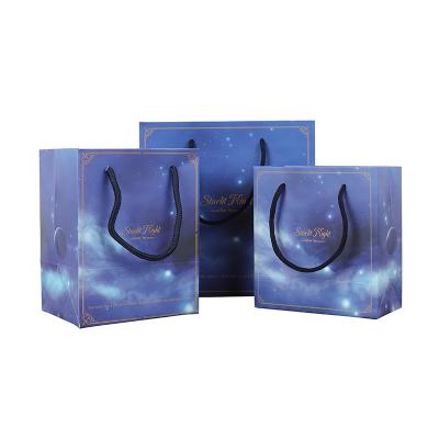 China Biodegradable Starry Exquisite Gift Bag Simple Blue Nebula Sky Stain Dress Dress Gift Storage Bag CIA Wind Starry Exquisite Bag Handbag for sale