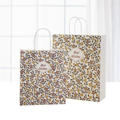 China Biodegradable Korean Floral Shopping Paper Bags Shopping Mall Bag Wrapping Paper Bag Universal Style Stain Handbag for sale