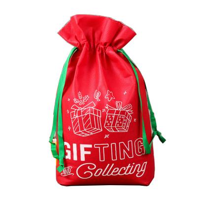 China Disposable High Quality Non Woven Drawstring Bags For Christmas Ready To Ship Stock Christmas Gift Wrapping Bag for sale