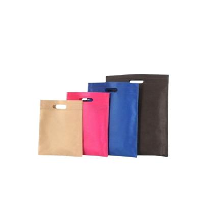 China BIODEGRADABLE Non Woven Colorful Waterproof Custom Die Cut Non Woven Gift Tnt Shopping Bag Die Cut Non Woven Shopping Bag for sale