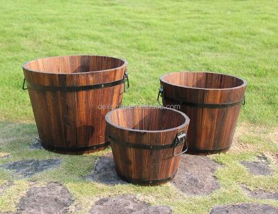 China Durable Outdoor Solid Cedar Wood Barrel Planter Set Of 3 Set Flower Pots Wood Wooden Barrel Planter for sale