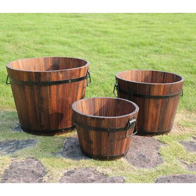 China Modern Wooden Barrel 3 Indoor Outdoor Wooden Planter Barrel Set with Drainage Holes Wooden Planter Wooden Bucket for sale