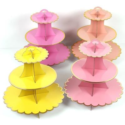 China 19 Color Folding Paper Cake Display Gold Stamp Flower Decoration Wedding Birthday Disposable Cupcake Stands for sale