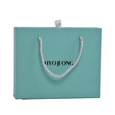 China Recycled Materials Luxury Custom Kraft Paper Box Portable Gift Drawer Blue Jewelry Clothes Box Accept Custom Logo for sale