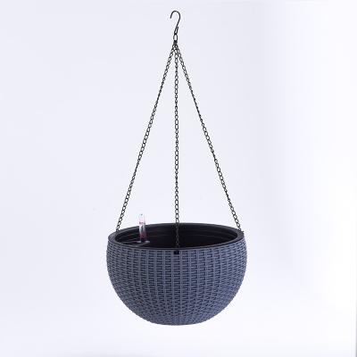 China Modern New Arrive Round Mini Rattan Planter Indoor Outdoor Hanging Self Watering Plastic Plant Pots for sale