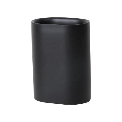 China Sustainable Bathroom Accessories Set Black Polyresin Water Cup Toothbrush Holder Tumbler for sale