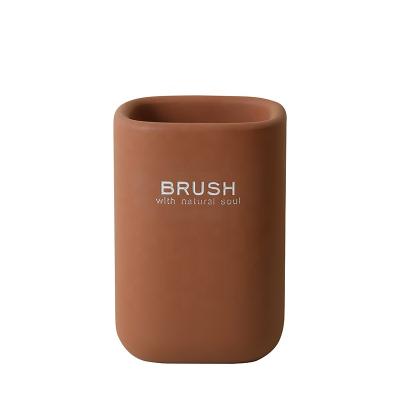 China Sustainable Bathroom Accessories Set Red Writing Concrete Water Cup Toothbrush Holder Tumbler for sale