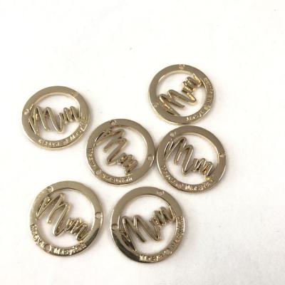 China Viable Decorative Sewing Accessories Labels Tag Gold Alloy Brand Logo Labels For Apparel for sale