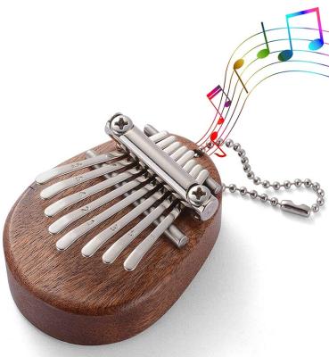 China Sapele Portable Exquisite Oval Wood Mini 8 Key Kalimba Thumb Piano for Gift for sale