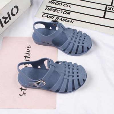 China Roman Shoes Candy Children's Hot Sales Waterproof Jelly Sandals School Beach Shoe Buckle Strap Sandals For Baby Kids for sale