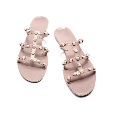 China Anti-Smell Fashion Big Size Rivet Open Toe Slippers Outdoor Beach Shoes Flat Shoes Flip Flops Women Slippers Sandals Custom Logo Jelly for sale