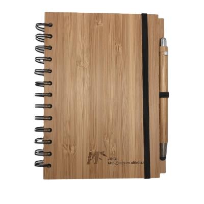 China Best Selling Bamboo Spiral Cover Smart A5 Notebook With Pen for sale