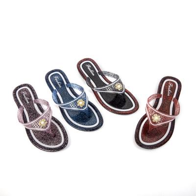 China Modern Design Sweat-absorbent Flower Embellished To Freeze Crystal Flip Flops for sale