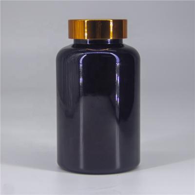 China Medicine Food Grade PET Black Round Plastic Capsules Medicine Pill Bottle With Gold Aluminum Lid 250cc 300cc for sale