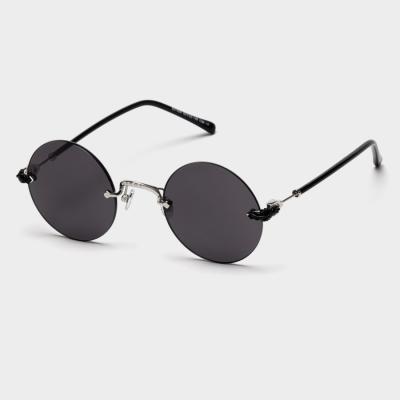 China Fashion sunglasses 2020 new European and American round frameless retro sunglasses men and women shape sunglasses for sale