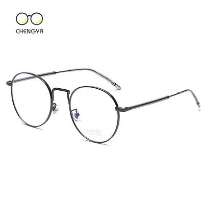 China Fashion sunglasses 2021 new glasses frame retro metal male round frame light anti-blue glass frame for sale