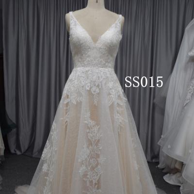 China Anti-wrinkle Spaghetti Tie Backless V-Neck Sequins Beading A-Line Wedding Dress Bridal Gown for sale