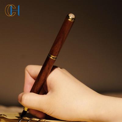 China Natural Witch Healing Rosewood New Arrival Magical Promotional Gift Seer Natural Gemstone Raw Crystal Pen for sale