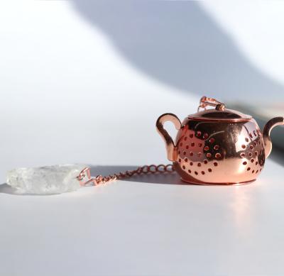 China New Viable Launched Customized Logo Rose Gold Teapot Shape Infuser Natural Crystal Pendant Tea Filter for sale