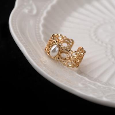 China Romantic 2022 Fashion New Style S925 Sterling Silver Hollow Pearl Ring Women'S Luxury Simple Pearl Denier Ring Romantic Jewelry Gift for sale