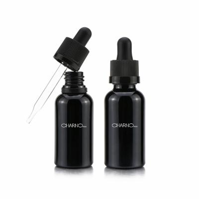 China Round 30ml 50ml 100ml Cosmetic Top Grade Antique Essential Oil Glass Bottle Black Glass Dropper for sale