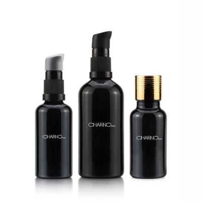 China Wholesale Cosmetic Empty Black Glass Essential Oil Spray Bottles 10ml 30ml 50ml 100ml With Orifice Reducer for sale