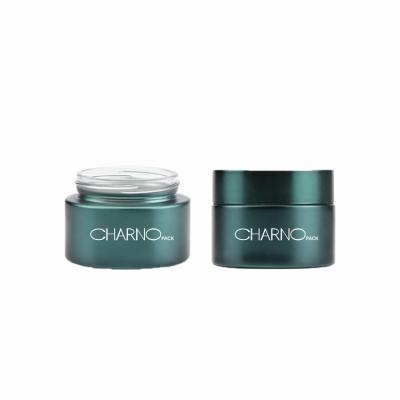 China 1oz 50ml Cosmetic Eco-Friendly Empty Green Frosted Skin Cream Glass Jars With Screw-On Lid For Hair Cream for sale