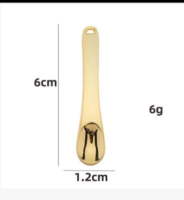 China New Arrival Cosmetic Plastic Spoon Painting Tool Spatula For Day Night Cream for sale