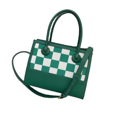 China Fashion new chessboard patchwork square box bag with main layer cowhide cross single shoulder handbag is designed by manufacture for sale