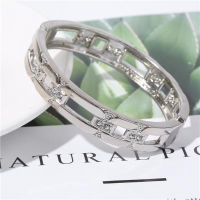 China Alloy CLASSIC Hollow Initial Circle Hollow Cuff Bracelet Fashion Diamond Silver Bangle For Men for sale