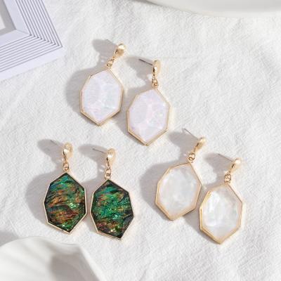 China FASHIONABLE advanced sense faceted color hexagon earrings retro resin turquoise stone earrings for sale