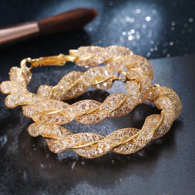 China FASHIONABLE Exaggerate Glitter Gold Plated CZ Crystal Hoop Earrings Gold Twist Mesh Earrings for sale