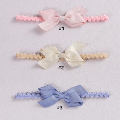 China Sporty baby bows ribbon and headbands lace up crown headband nylon kids hair bows hair accessories for sale