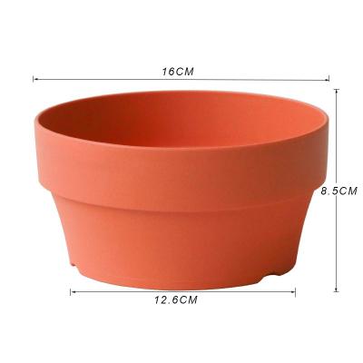 China Eco - Friendly Indoor Outdoor Decor Plastic Clay Color Small Flower Planters With Drainage And Trays for sale