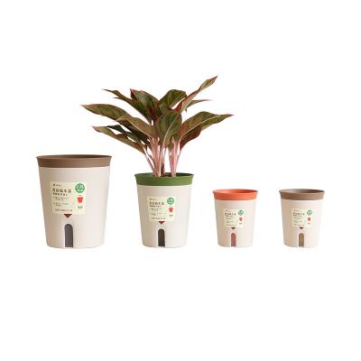 China New Design CLASSIC Plastic Minimalist Decorative Multi Color Smart Planter Pots With Self Watering System And Water Indicator for sale