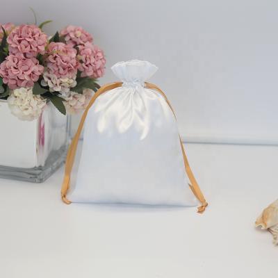 China Custom Logo Wholesale Drawstring Packaging White Color Gift Bag Silk Zipper Pouch for sale