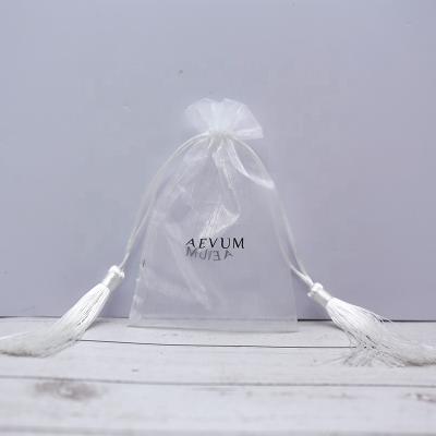 China Custom Zipper Organza Wrapping Pouches With Tassel Drawstring Gift Organza Wrapping Pouch for sale