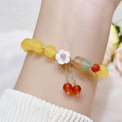 China Vintage 18K Gold Plated Yellow Agate Stone Shell Flower Tassel Bracelet Natural Trendy for sale