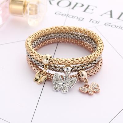 China FASHIONABLE Korean Women's Popcorn Popcorn Suit Chain Alloy Three Color Diamond Butterfly Pendant Bracelet for sale