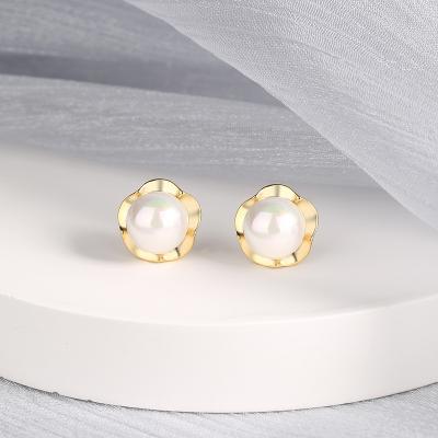 China TRENDY S925 sterling silver Korean version of the popular all-match fashion all-match pearl flower earrings niche design ISS fashion earrings for sale