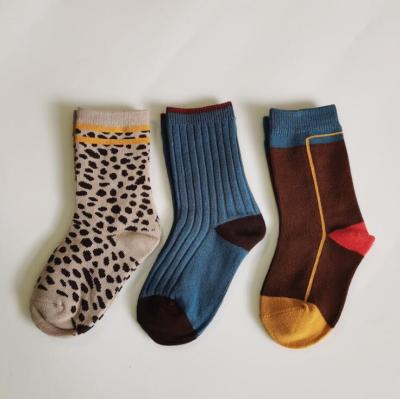 China Infant Viable Kids Socks Solid Color Doze Non-slip Floor Socks Kids Stocking Leopard Print Baby Socks for sale