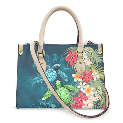 China 2021 High Quality Kosrae Polynesian Blue Green Turtle Flower Small Handbags Tribal White PU Leather For Women Luxury Leather Design for sale