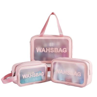 China Lady Custom Logo Travel Transparent Vinyl Waterproof Beach Zipper Pouch TSA TPU Cosmetic Clear PVC Toiletry Bag With Handle for sale