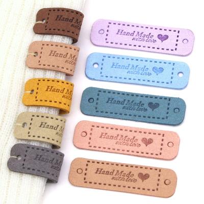 China 20Pcs 56x15MM Viable Sewing Crafts Leather Trim Labels Handmade Tags For Clothes Hats Handcrafted With Love Labels for sale