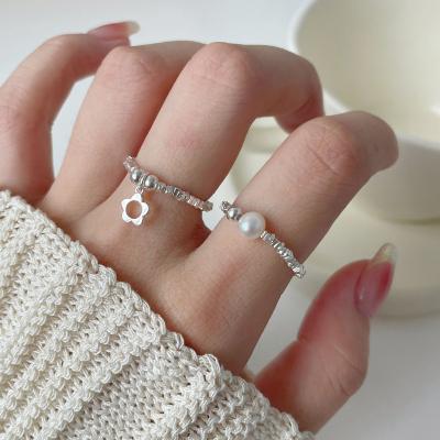 China Freshwater Ring 925 Sterling Silver Elastic Freshwater Pearl Flower Ring Elastic Rope or Flower Ring For Girls And Women for sale