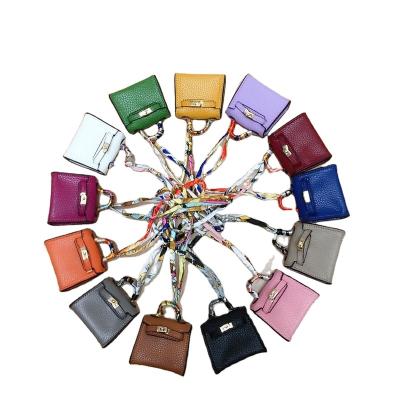 China Fasion Mini Leather Bag Pendant for Cute Female Simulation Leather Earphone Creative Car Key Chain Tote Bag Hanging Decoration for sale