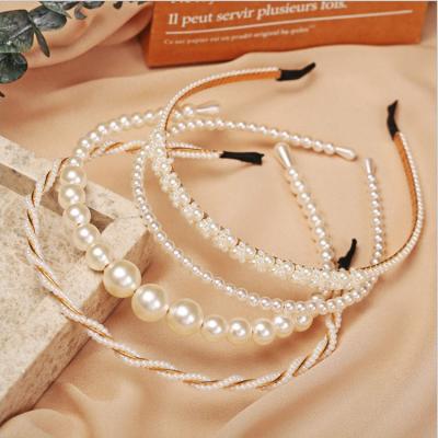 China Fashion wholesale low price white pearl beaded headband hair accessories handmade knotted to bead elegant headbands for women for sale